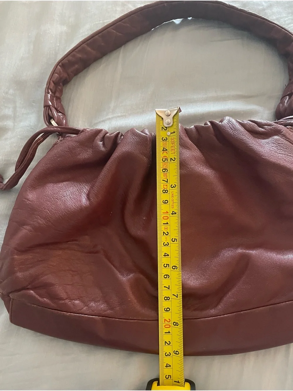Vintage Franco Sarto Gathered Shoulder Boho Bag in burgundy leather.